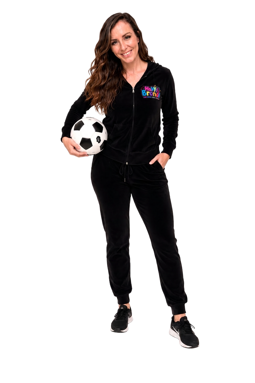 Ms. Brendi smiling in her signature black Brendi hoodie